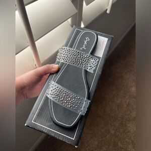 Black sandals with clear straps